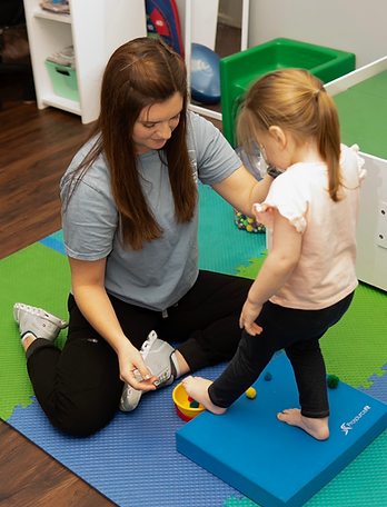 Child doing physical therapy exercises