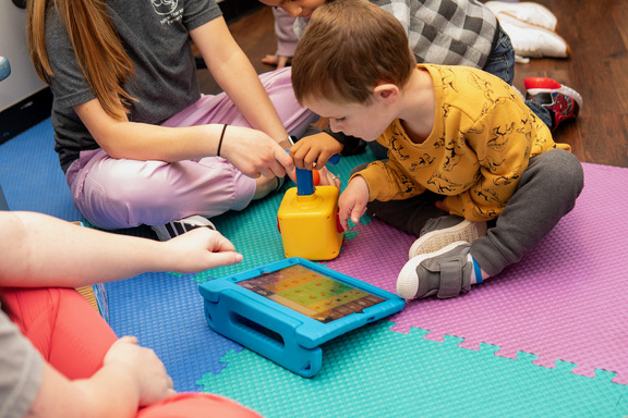 Therapist working on speech with a child
