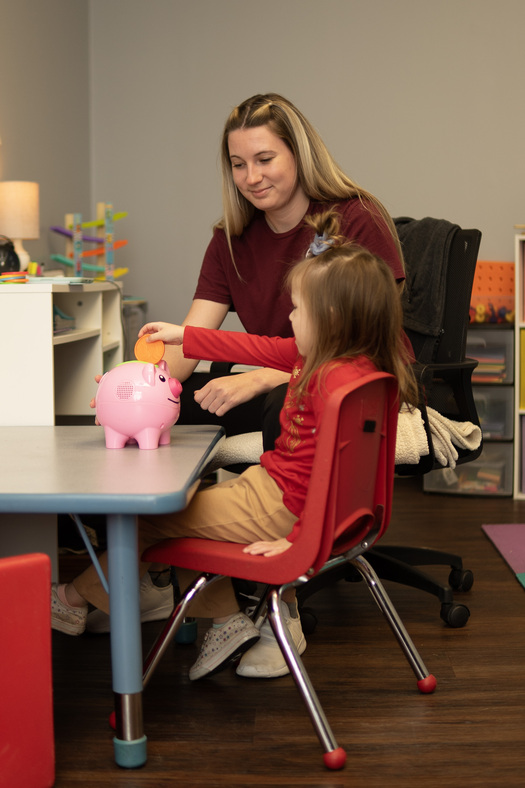 Child playing with blocks for occupational therapy